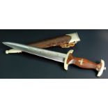 A Second World War Third Reich SA dagger, the mahogany handle inset with typical eagle and swastika,