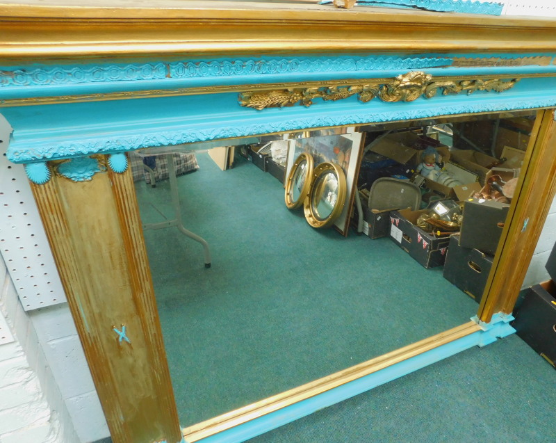 A turquoise painted and gilt gesso overmantel mirror, 69cm wide