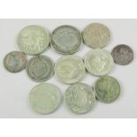 A collection of silver and white metal coins, to include a 1777 Maximilian III Joseph 20 Kreuzer,