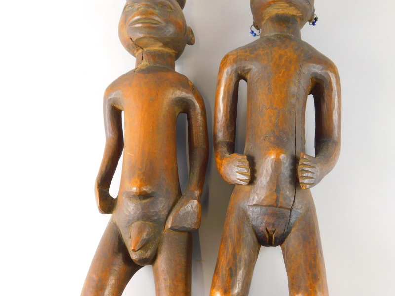 Tribal Art. A pair of early 20thC African fertility type figures, the female figure with earrings - Image 4 of 5