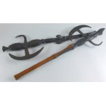 Two African tribal carved hardwood axes, with shaped crescent metal ends, and carved handles, 64cm