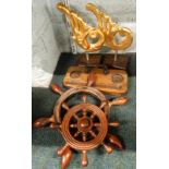 A 20thC wooden reproduction ship's wheel, 34cm wide, another, pair of gilt carvings probably from