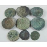 A collection of Byzantine bronze coins, for the Emperors Justinius I, Alexi etc. (9)