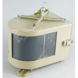 A 1448 Verks-NR metal cased barograph, of domed outline with glass top, 20cm high. (Partially