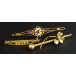 Three stick pins, to include a Victorian amethyst and seed pearl bar brooch, yellow metal, unmarked,