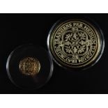A Millionaires gold edition collection proof coin, the Double Leopard gold edition and another