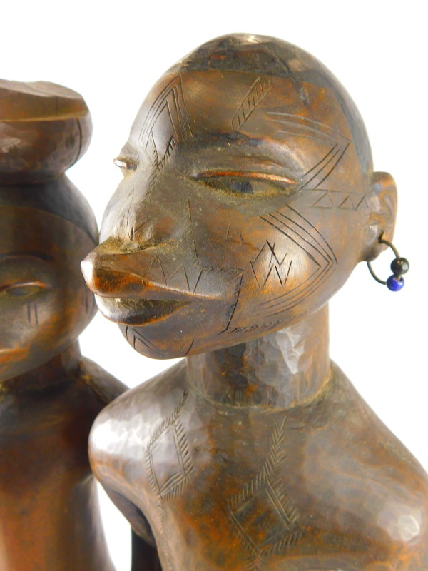 Tribal Art. A pair of early 20thC African fertility type figures, the female figure with earrings - Image 3 of 5