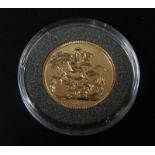 A 2011 Queen Elizabeth II full gold uncirculated sovereign, in case