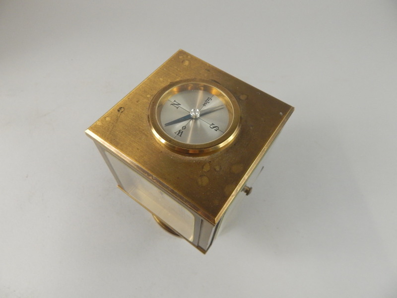 An Angelus brass barometer and mantel timepiece, with four silvered dials, on a swivel base - Image 3 of 4