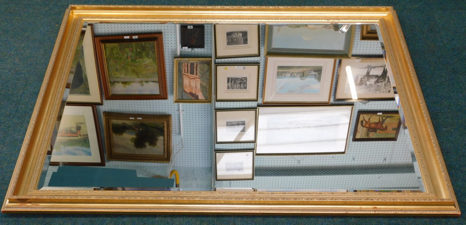 A gilt wall mirror, with a bevelled plate, 130cm x 106cm