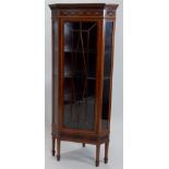 An Edwardian mahogany and marquetry corner display cabinet, with a moulded cornice above a lozenge