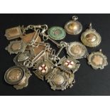 A collection of Lincolnshire football related medallions and fobs, to include two 9ct gold examples,