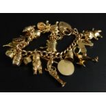 A 9ct gold charm bracelet, with a collection of approx 22 charms, including bowler hat, pistol, dog,