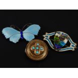 A silver and white enamel butterfly brooch, a sterling and enamel brooch and a Victorian gilt