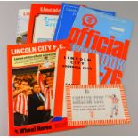 A collection of Lincoln City Football Club handbooks and year books, for 1951-52, 1947-48, 1990,