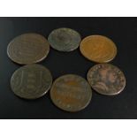 Six collector's coins, to include George V 1933 one penny, a Coco Household Ltd Brian one token, a