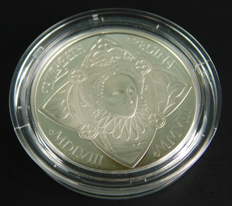 An Elizabeth I commemorative £5 silver proof coin, dated 2008 with certificate of authenticity