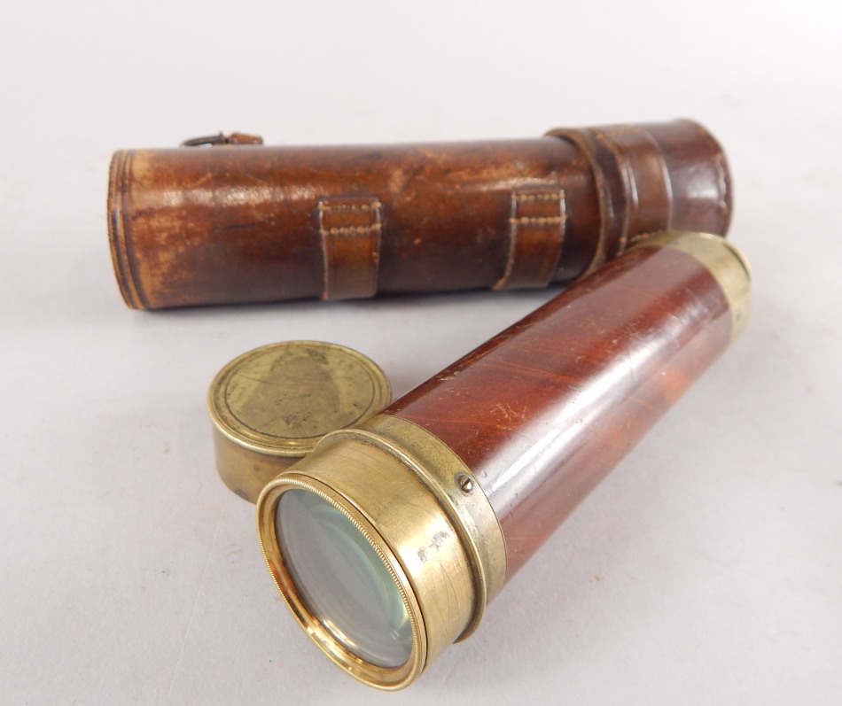 A brass and mahogany three draw telescope by Bate of London, in leather travelling case