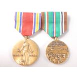 Two United States medals, a 2nd World War Victory medal and a Europe, Africa & Middle Eastern 2nd