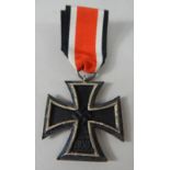 A Third Reich 1939 Iron Cross, with later ribbon.