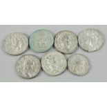 Seven replica Roman coins, cast with Julius Phillipus and Trajan Decius