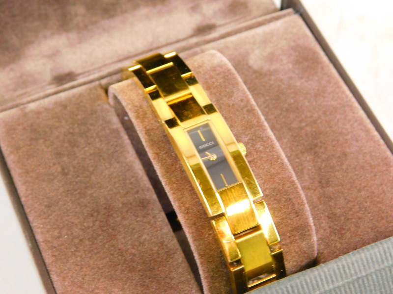 A Gucci gold plated ladies wristwatch, in a fitted case, original retailers card for Fenton Hill - Image 2 of 2