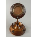 A Victorian turned walnut watch stand, decorated with studs, 16cm high