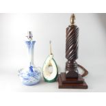 A collection of table lamps, to include a delft style lamp, decorated in blue with a windmill, a