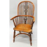 A mid 19thC yew, ash and elm Windsor chair, with a pierced splat, solid seat, on turned legs with