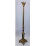 An early 20thC Continental gilt gesso and giltwood standard lamp, modelled in the form of a reeded