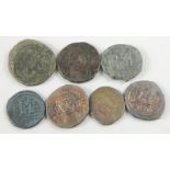 Seven Byzantine Follis style coins, bearing the bust of Justinian I and II etc.