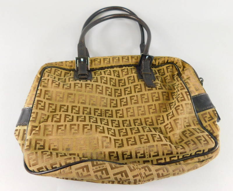 A ladies Fendi canvas and leather bag.