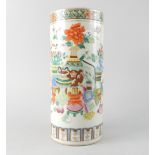 A 20thC Chinese cylindrical vase, decorated with vessels, flowers etc., in Canton style enamels,