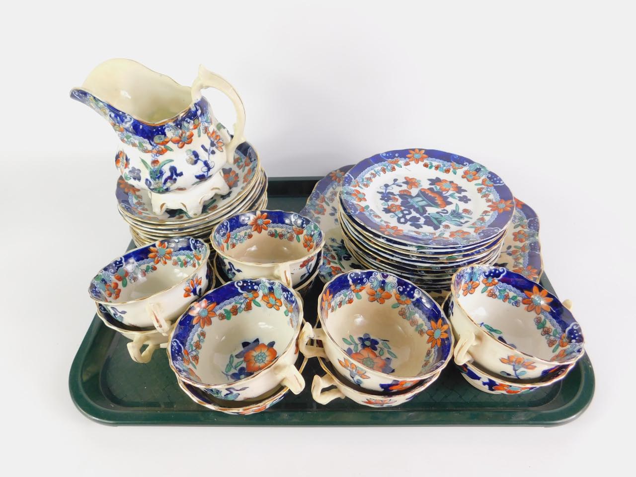 A Staffordshire mid 19thC part tea service imari decorated with flowers, comprising cream jug, bread - Image 3 of 3