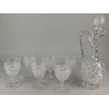 An early 20thC cut crystal claret jug and stopper, and six matching goblets, by repute Thomas Webb