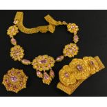 A suite of early 19thC pink topaz jewellery, including brooch, bracelet and necklace, yellow