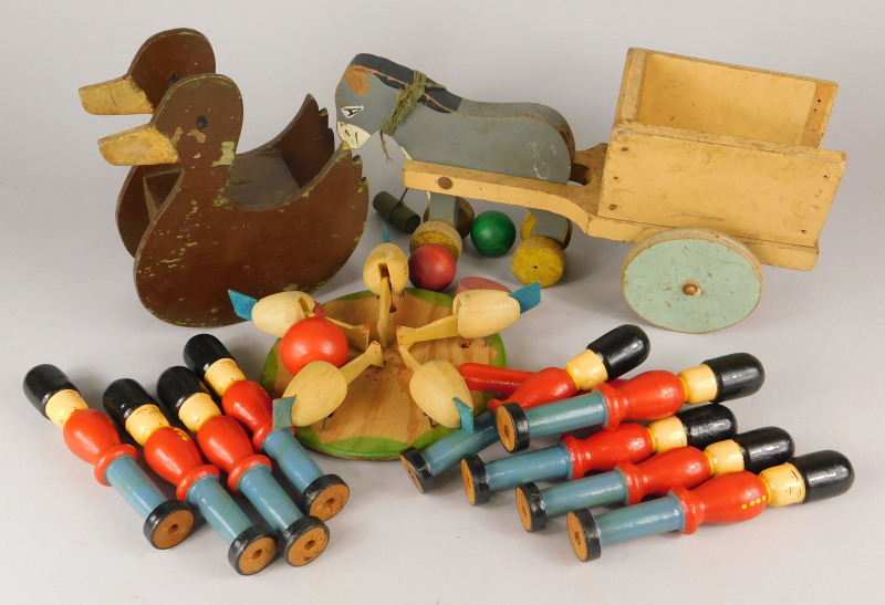 A collection of children's toys, to include a Tri-ang push along horse and cart, soldier shaped