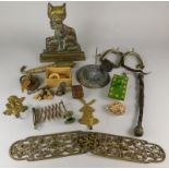 Various collectors items, to include a small lead sundial, a Cheshire cat door stop, a bronze dog