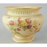 A Royal Worcester porcelain vase, painted with flowers, picked out in gilt, on a blush ivory ground,