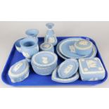 A large quantity of Wedgwood pale blue Jasper ware, to include commemorative plate, Royal family pin