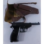 Withdrawn prior to sale. A deactivated Walther P38 pistol, with leather holster, 1943, number 9085a