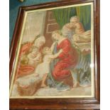 A 19thC woolwork picture, depicting children, figures etc., in contemporary figured mahogany cushion