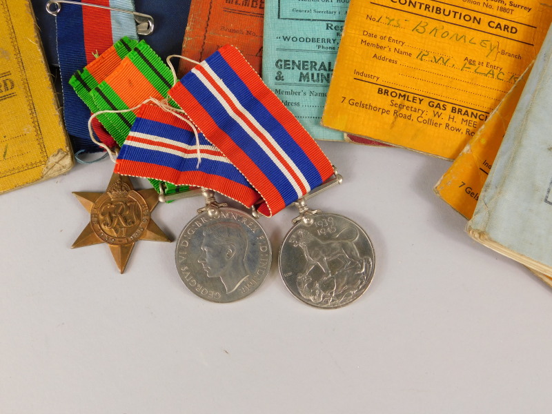 A collection of WWII medals and ephemera relating to a Private R W Flack, of The Bedfordshire and - Bild 3 aus 5