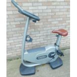 An Excite techno gym exercise bicycle