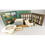 A collection of items, to include cigarette cards, a mauchline ware needle holder, two trenchart