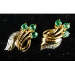 A pair of 9ct gold earrings, set with tiny white stones and green stones, in a floral spray, 1.7g