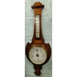 An Edwardian mahogany and marquetry wheel barometer, with opaque glass thermometer and dial, 87cm