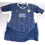 A signed Leeds United football shirt, sponsored by Whyte and Mackay, circa 2005/6