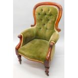 A Victorian mahogany show-frame chair, with a button padded back, padded seat and arms on scroll