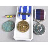 A collection of medals, to include an RAF long service and Good Conduct medal and a NATO medal